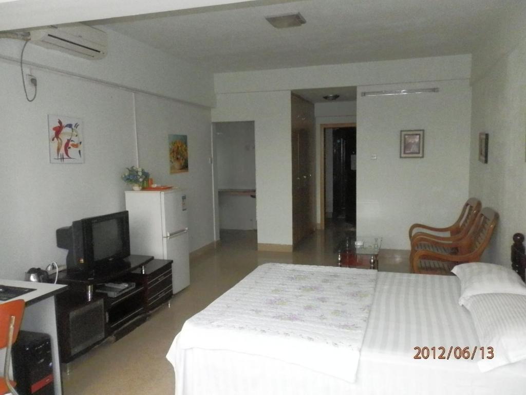 Xingfu Hotel Наньнин Номер фото