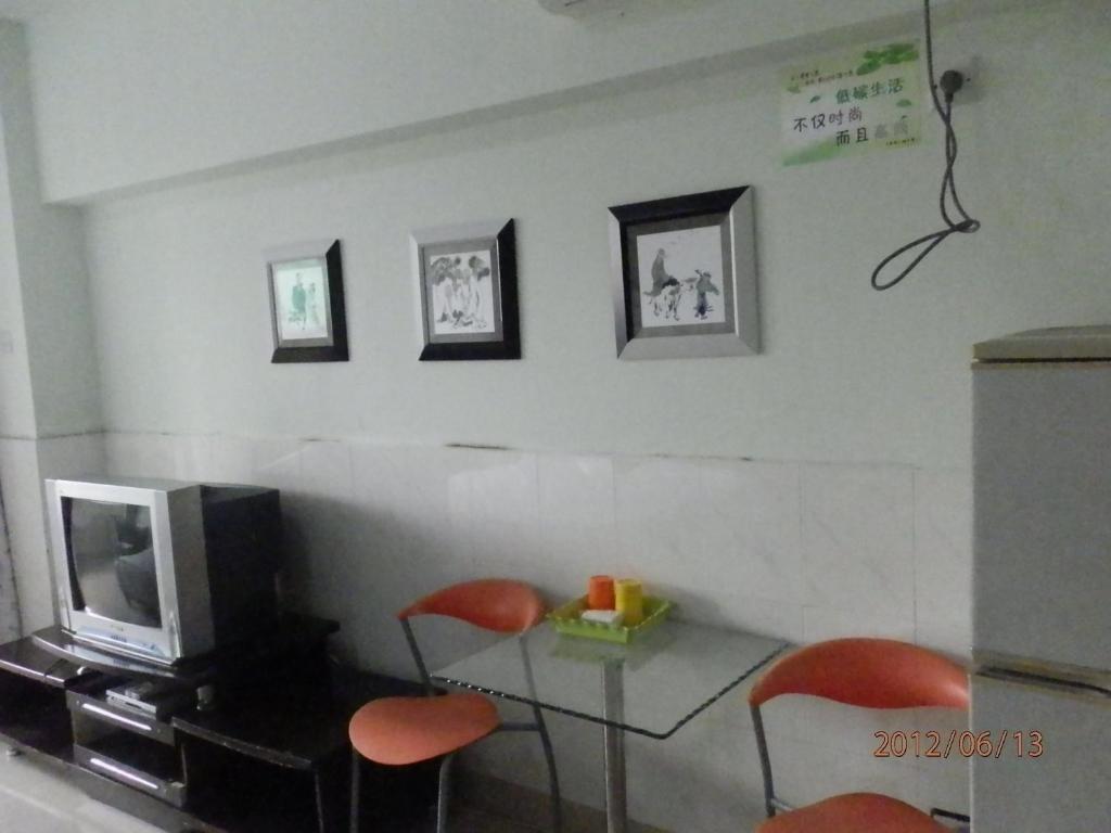 Xingfu Hotel Наньнин Номер фото