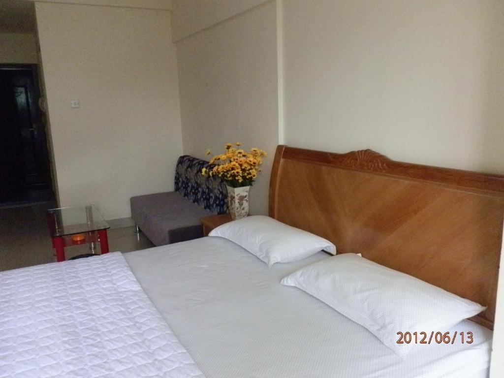 Xingfu Hotel Наньнин Номер фото