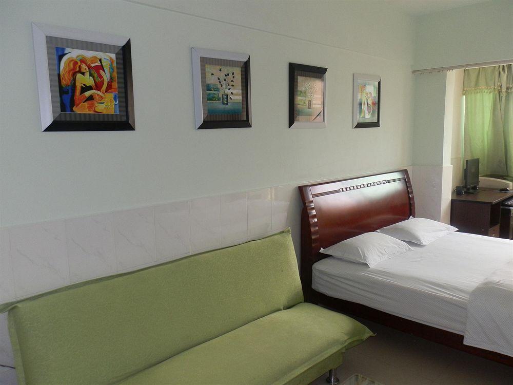 Xingfu Hotel Наньнин Экстерьер фото