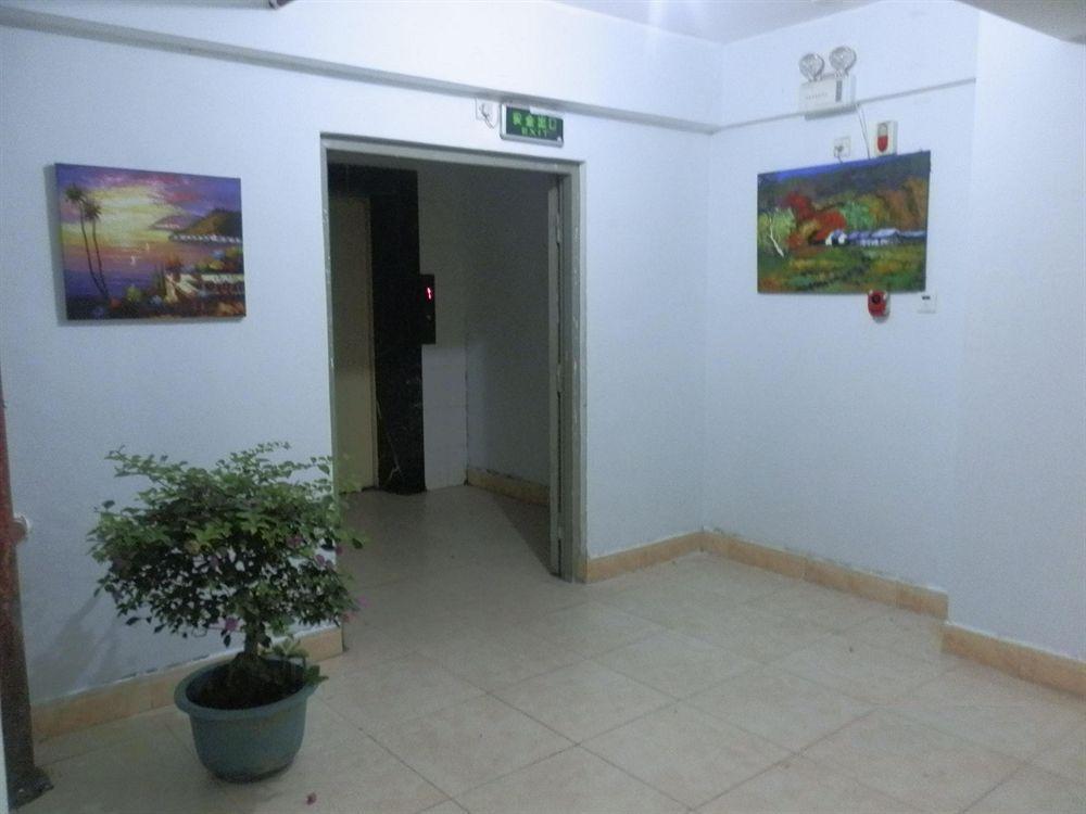 Xingfu Hotel Наньнин Экстерьер фото